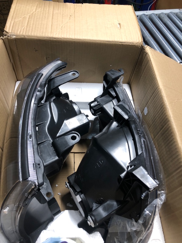 Photo 1 of **DAMAGED, MOUNTING BRACKET IS CRACKED**
Nilight Headlight Assembly for 2005 2006 2007 2008 2009 2010 2011 Toyota Tacoma Replacement Headlamp Black Housing Amber Reflector