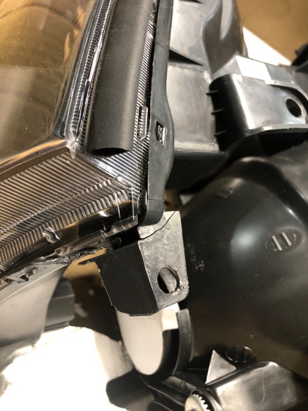Photo 1 of **DAMAGED, MOUNTING BRACKET IS CRACKED**
Nilight Headlight Assembly for 2005 2006 2007 2008 2009 2010 2011 Toyota Tacoma Replacement Headlamp Black Housing Amber Reflector