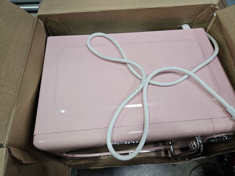 Photo 1 of ***PARTS ONLY***Nostalgia Retro Compact Countertop Microwave Oven - 0.7 Cu. Ft. - 700-Watts with LED Digital Display - Child Lock - Easy Clean Interior - Pink