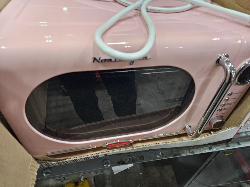 Photo 1 of ***PARTS ONLY***Nostalgia Retro Compact Countertop Microwave Oven - 0.7 Cu. Ft. - 700-Watts with LED Digital Display - Child Lock - Easy Clean Interior - Pink