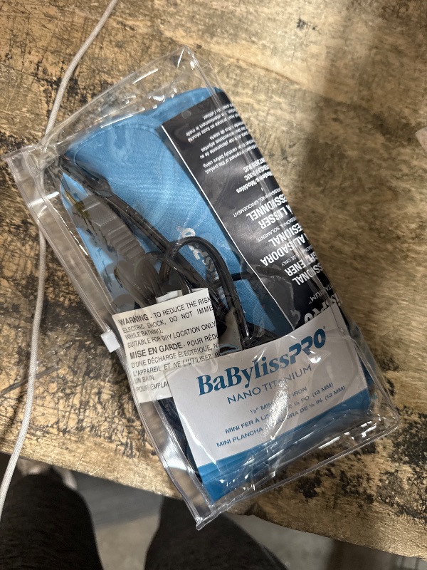 Photo 1 of BaBylissPRO Nano Titanium Mini Straightening Iron Blue 0.5 Inch