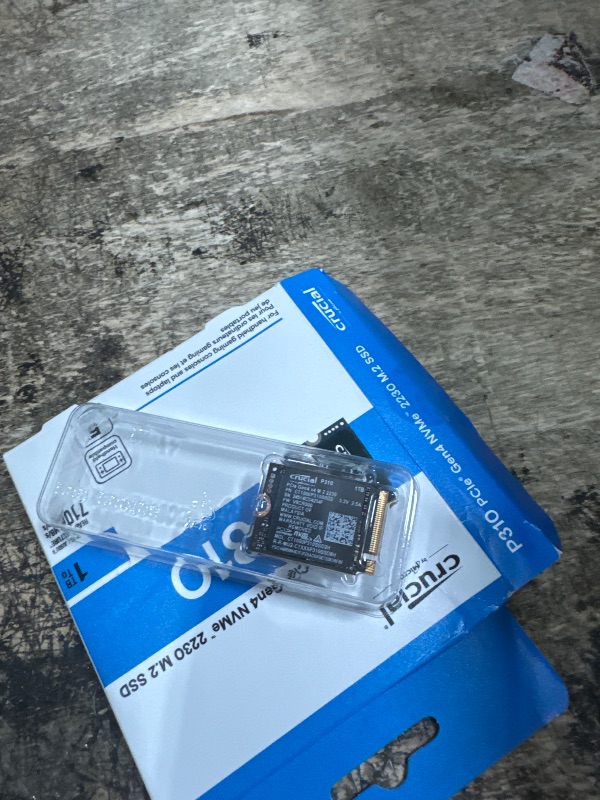 Photo 1 of *UNKNOWN IF USED* Crucial P310 1TB PCIe Gen4 2230 NVMe M.2 SSD - Up to 7,100 MB/s - Uplevel Your Console - Internal Solid State Drive (PC) - CT1000P310SSD2?