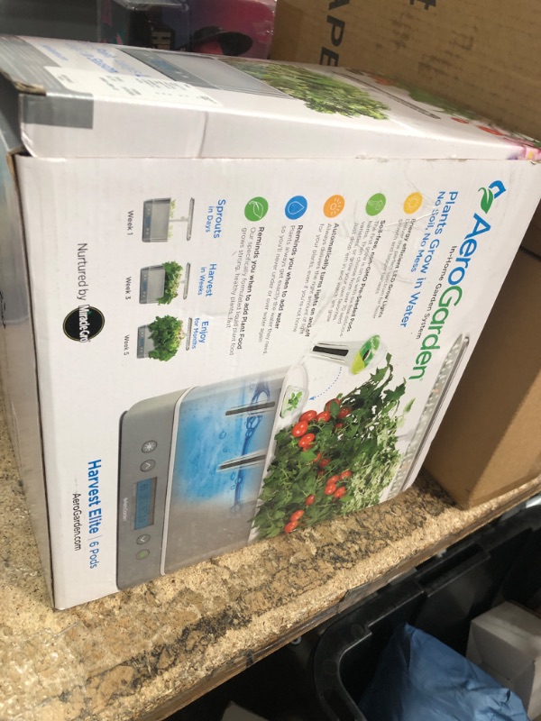 Photo 1 of AeroGarden Harvest Elite Indoor Garden Hydroponic System with LED Grow Light and Seed Kit, Holds up to 6 Pods, Stainless Steel