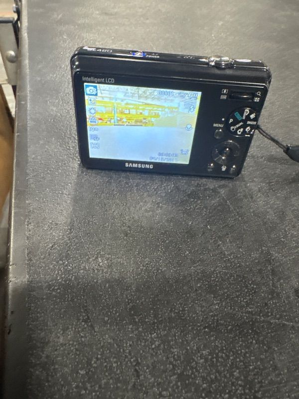 Photo 1 of ***No power cord***
Samsung SL420 10MP Digital Camera with 5x Dual Image Stabilized Zoom and 2.7 inch LCD (Black)..