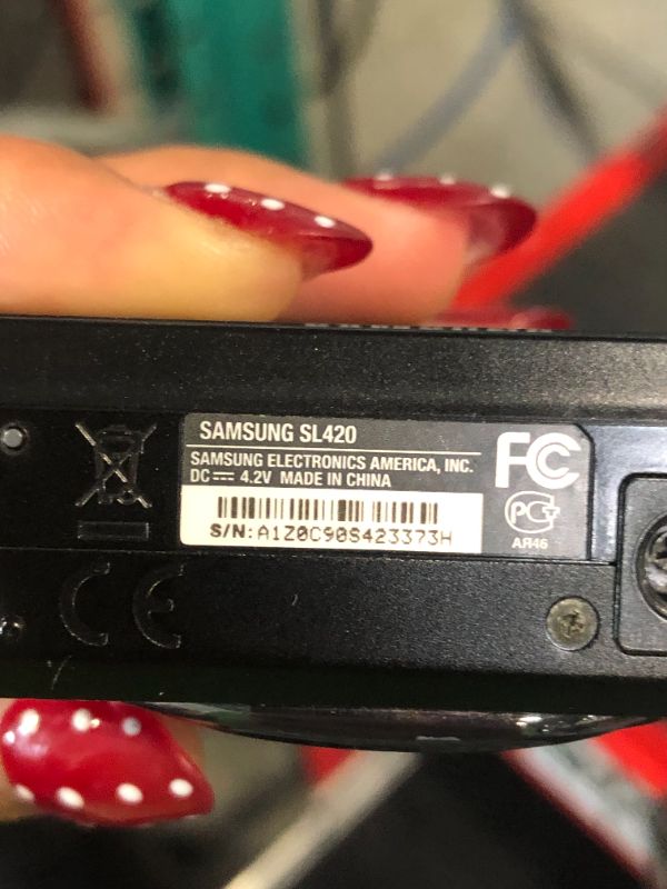 Photo 1 of ***No power cord***
Samsung SL420 10MP Digital Camera with 5x Dual Image Stabilized Zoom and 2.7 inch LCD (Black)..