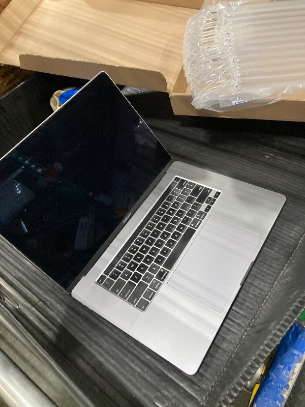 Photo 1 of **LOCKED** Apple MacBook Pro Late 2019 with 2.6GHz Intel Core i7 (16 inch, 16GB RAM, 512GB) Space Gray (Renewed)