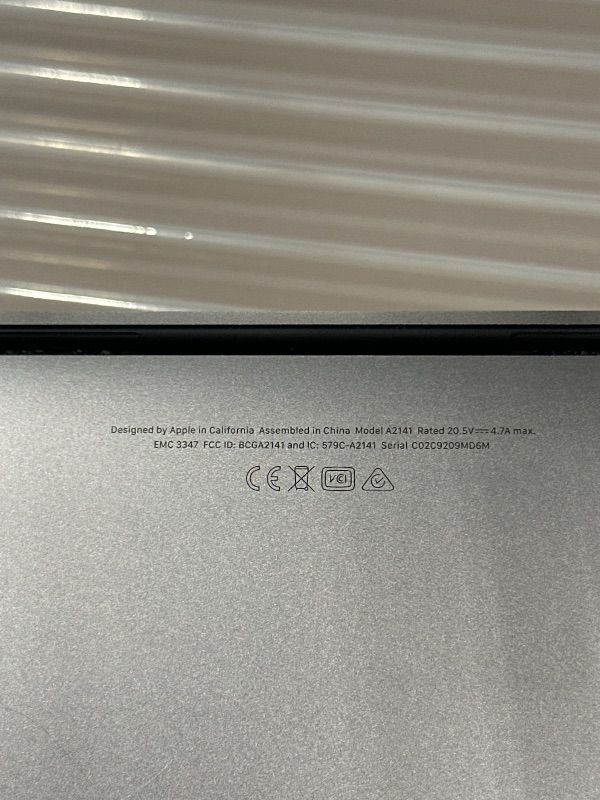 Photo 1 of **LOCKED** Apple MacBook Pro Late 2019 with 2.6GHz Intel Core i7 (16 inch, 16GB RAM, 512GB) Space Gray (Renewed)