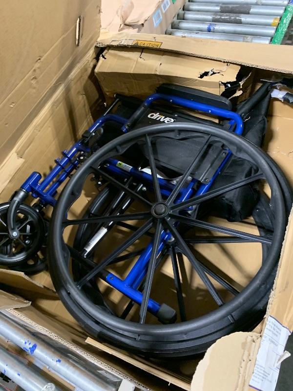 Photo 1 of ** VERY USED ******* Drive Medical BLS18FBD-ELR Blue Streak Lightweight Wheelchair with Swing-Away Elevating Leg Rests and Flip-Back Arms