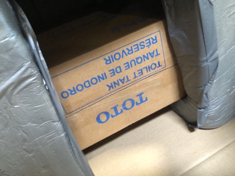 Photo 1 of ***TOILET TANK ONLY*** TOTO Drake Two-Piece Elongated 1.6 GPF TORNADO FLUSH Toilet with CEFIONTECT