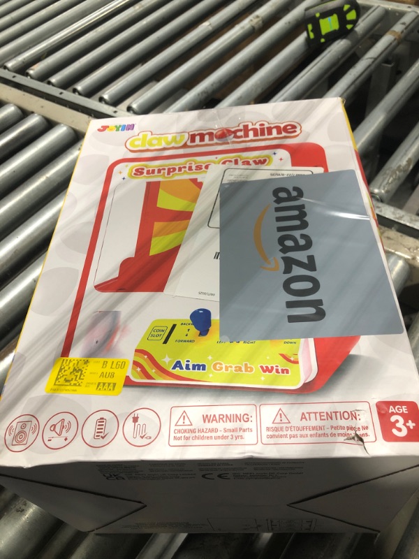 Photo 1 of JOYIN Claw Machine Arcade Toy with LED Light & Adjustable Sound, Rechargable Dispenser Toys Mini Vending Machine for Kids - Perfect Christmas & Birthday Big Gifts for Kids, Ages 3+