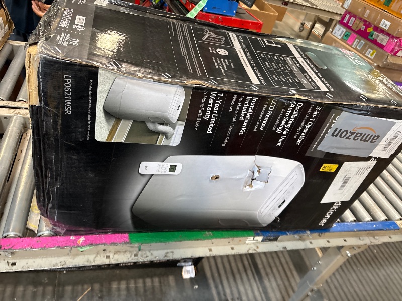 Photo 1 of **ITEM IS DIRTY**LG 6,000 BTU Portable Air Conditioner, 115V, Cools 250 Sq.Ft. (10' x 25' Room Size), Portable Air Conditioner for Home with Quiet Operation, LCD Remote Control, and Window Installation Kit, White