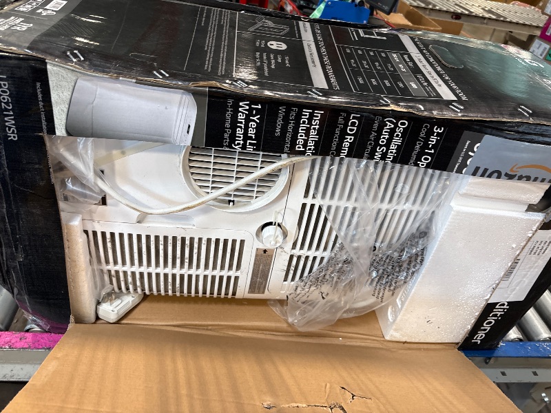 Photo 1 of **ITEM IS DIRTY**LG 6,000 BTU Portable Air Conditioner, 115V, Cools 250 Sq.Ft. (10' x 25' Room Size), Portable Air Conditioner for Home with Quiet Operation, LCD Remote Control, and Window Installation Kit, White