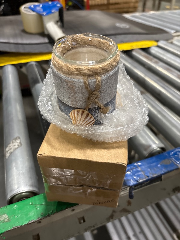 Photo 1 of **one shell fell off can be glued back on**
CoTA Global Silver Sea Wooden Seashell Candle Holder - Tabletop Coastal Decor for Home with Seashell Ornaments, Handcrafted Rustic Candle Holder Centerpiece for Tables, Shelves - Color May Vary
