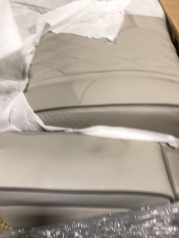 Photo 1 of * Will need a truck for pickup * Signature Design by Ashley Boyington Contemporary Leather Match Power Reclining Sofa with USB Charging Ports, LED Lights and Adjustable Headrest, Light Gray * Has a small smudge mark on armrest*
