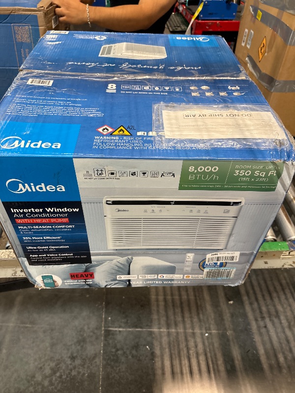 Photo 1 of **CORNER BENT**
Midea 8,000 BTU Smart Inverter Air Conditioner Window Unit with Heat and Dehumidifier – Cools up to 350 Sq. Ft., Energy Star Rated, Quiet Operation, Electronic Controls, Remote Control, White