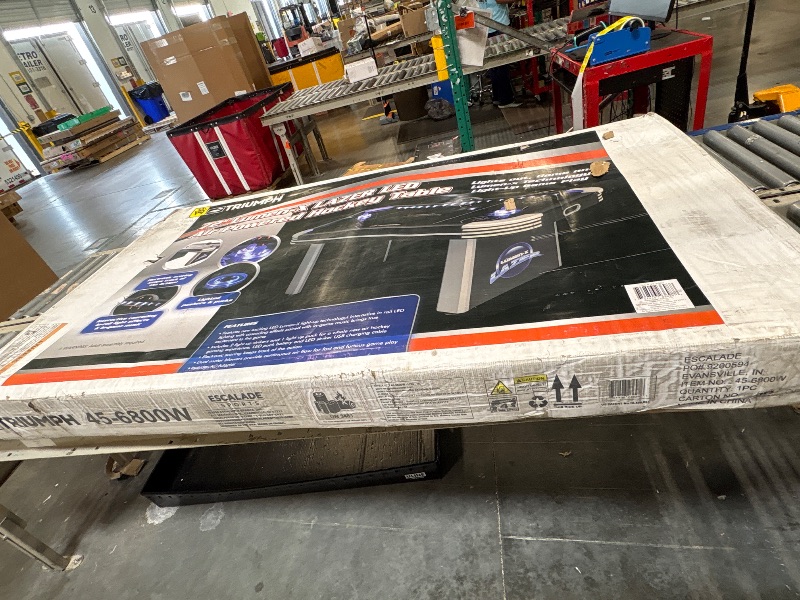 Photo 1 of **will need truck for pick up**
Triumph Sports Lumen-X Lazer 6' Interactive Air Hockey Table Featuring All-Rail LED Lighting and In-Game Music