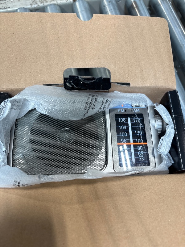 Photo 1 of **scratch on radio**
Panasonic Portable AM / FM Radio, Battery Operated Analog Radio, AC Powered, Silver (RF-2400D)