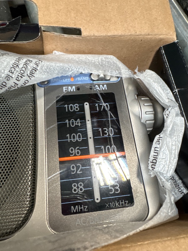 Photo 1 of **scratch on radio**
Panasonic Portable AM / FM Radio, Battery Operated Analog Radio, AC Powered, Silver (RF-2400D)
