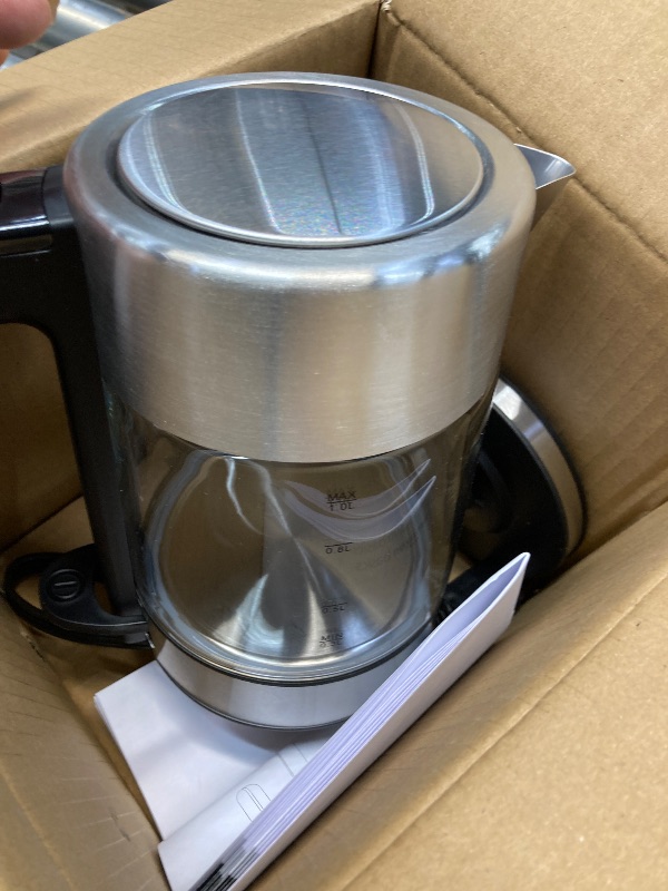 Photo 1 of Amazon Basics 1.1-Qt (1.0L) Electric Kettle, Electric Tea Kettle & Water Boiler, With Auto Shut-Off, Boil Dry Protection, High-Safety Strix Thermostat, BPA-Free, 1500W, Glass Carafe, Black & Silver