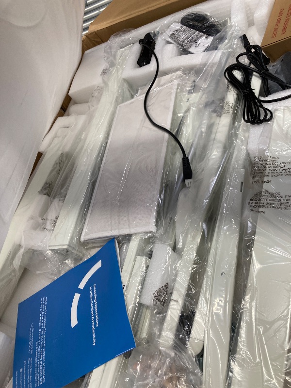 Photo 1 of HUANUO 65? L-Shaped Standing Desk with Power Outlets & LED Strip, Electric Height Adjustable Corner Computer Desk, Sit Stand Up Desk with 3 Drawers, Natural Wood