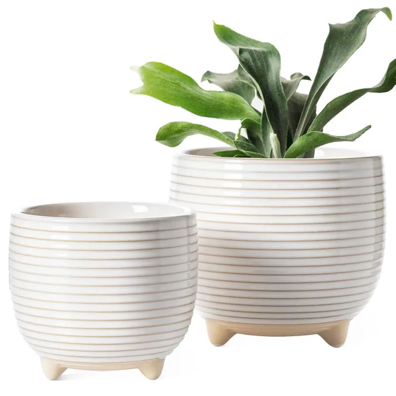 Photo 1 of BEMAY Plant Pots, 5.1"+6.4" Ceramic Planters with Drainage, Mesh Circle and Plug Planter Pots for Home Office, Reactive Glaze White Succulents Flower Pots
