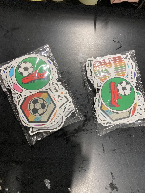 Photo 1 of 100PCS Soccer Stickers for Water Bottle World Cup Laptop Sticker Vinyl Waterproof Stickers Wardrobe Car Skateboard Phone Luggage Guitar Decal for Kids ***(2 Packs)***