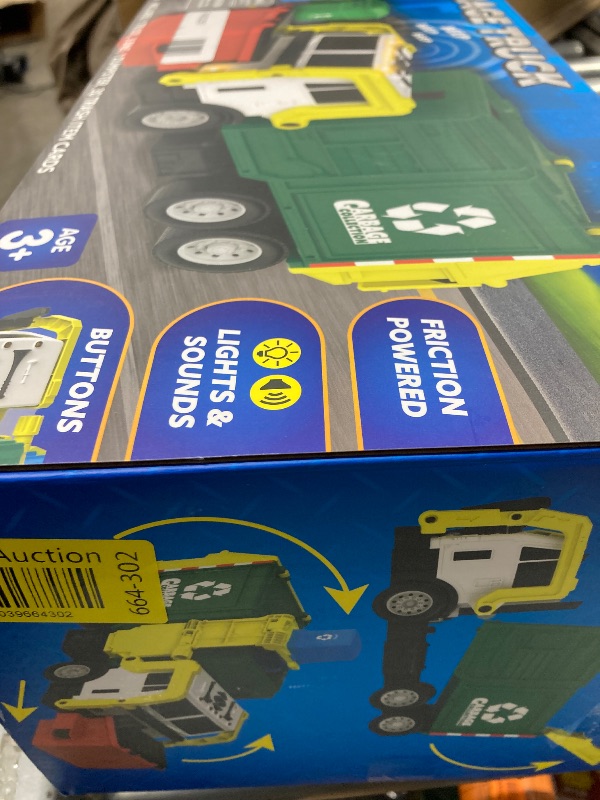 Photo 1 of 
PLAY ACT GARBAGE TRUCK  FRICTION POWERED LIGHTS AND SOUNDS