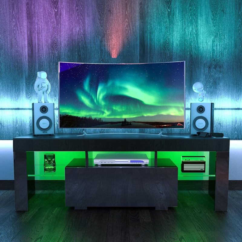 Photo 1 of MAY BE SIMILAR TO JOYSOURCE Black LED TV Stand High Glossy Front Entertainment Center Modern Television Stands with Large Storage Wood TV Stand for 55/60 Inch TV Gaming Media TV Console for Living Room Bedroom

TV STAND 
SKU: JXYTVS003W