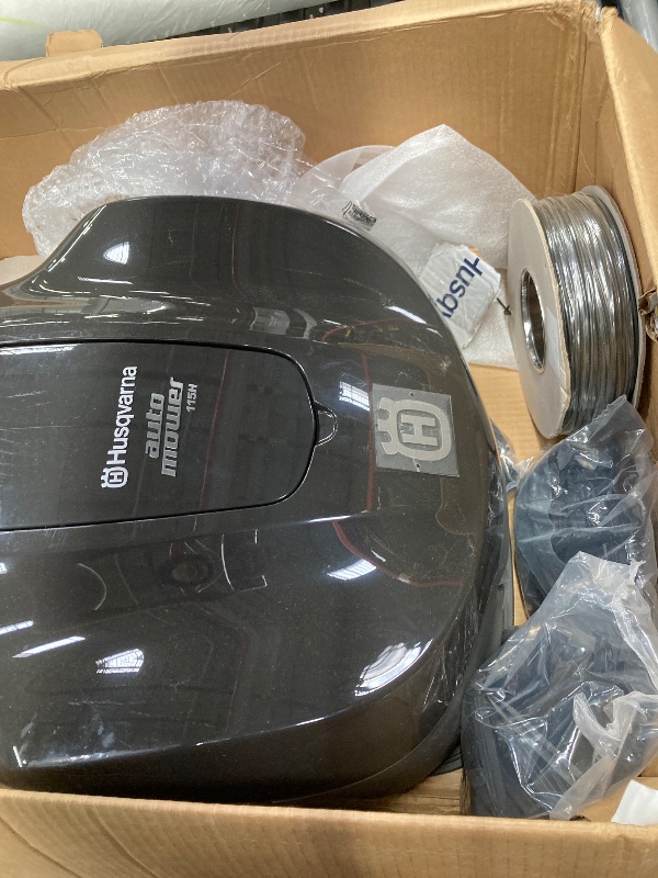 Photo 1 of ***MISSING PARTS***Husqvarna Automower 115H 4G Robotic Lawn Mower with Patented Guidance System, Automatic Lawn Mower with Self Installation and Ultra-Quiet Smart Mowing Technology for Small to Medium Yards (0.4 Acre)