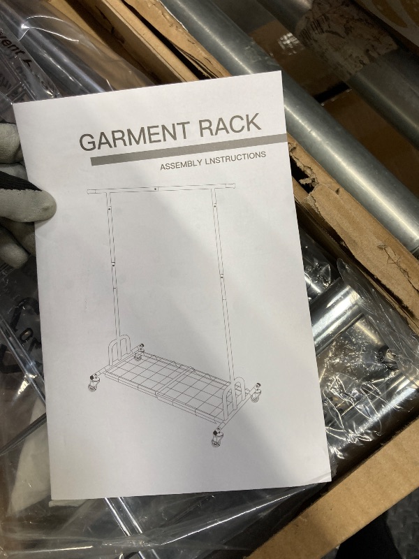Photo 1 of  Garment Rack Portable Freestanding Modern Clothes Rack, Silver