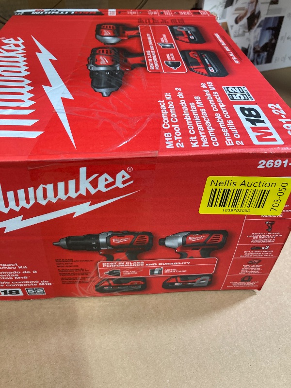 Photo 1 of **Missing parts without charger***Milwaukee 2697-22 M18 18-Volt Lithium-Ion Cordless Hammer Drill/Impact Driver XC Combo Kit (2-Tool)