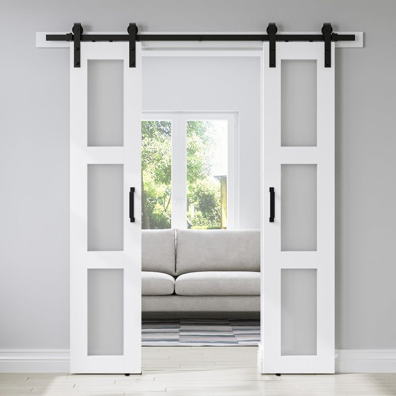 Photo 1 of **DOOR ONLY/MISSING HARDWARE**Double 18 x 80in 3-Panel Sliding Barn Door with Frosted Glass - Waterproof, Easy Assembly, Pre-Drilled Holes  PINE WHITE