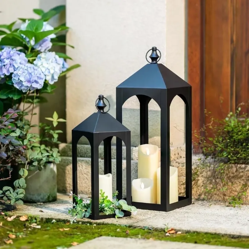 Photo 1 of  ***DAMAGE, LARGE LANTERN BENT/DENTED***SELLING AS IS *** 
Nuptio Tall Black Lanterns Decorative Indoor for Pillar Candle Holder , Indoor Outdoor Lanterns for Porch & Patio ,17" & 23" Set of 2 ,No Glass