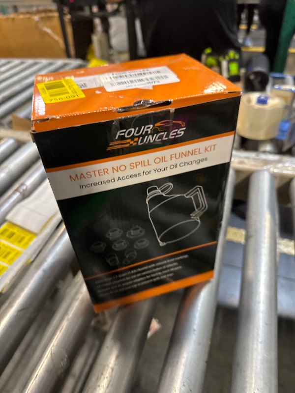 Photo 1 of FOUR UNCLES 15-Piece No-Spill Engine Oil Funnel Kit for Automotive Use - 1.5 Qt Funnel with 14 Adapters for Easy Filling, One-Hand Operation