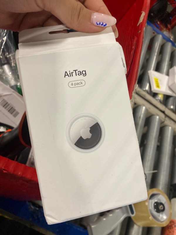 Photo 1 of **LOCKED** Apple AirTag 4 Pack. Keep Track of and find Your Keys, Wallet, Luggage, Backpack, and More. Simple one-tap Set up with iPhone or iPad