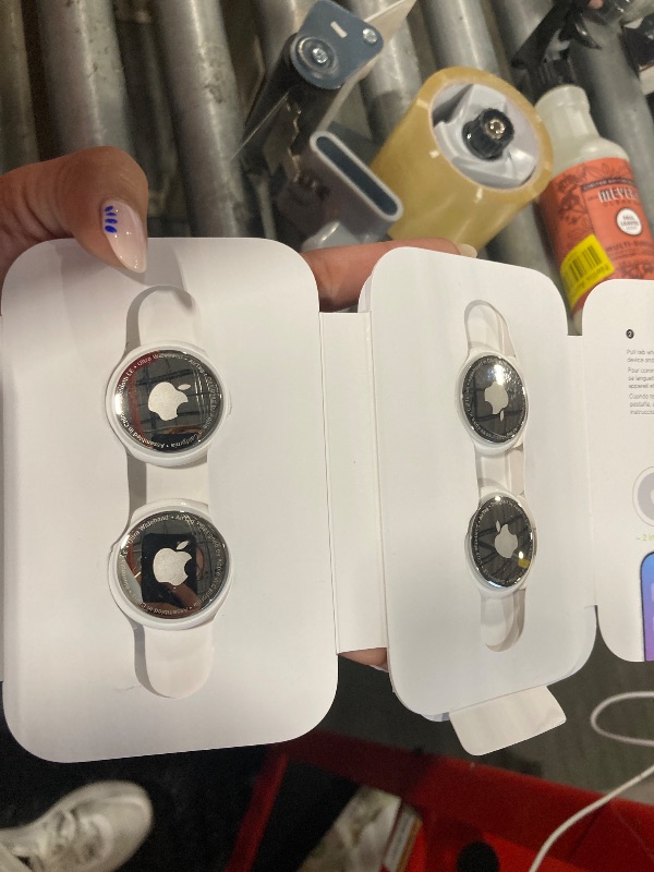 Photo 1 of **LOCKED** Apple AirTag 4 Pack. Keep Track of and find Your Keys, Wallet, Luggage, Backpack, and More. Simple one-tap Set up with iPhone or iPad