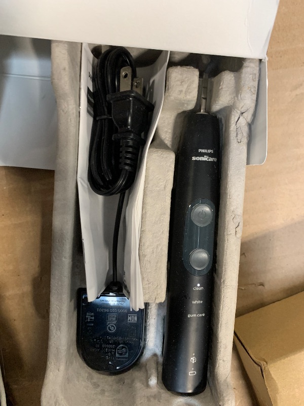 Photo 1 of Philips Sonicare ProtectiveClean 5300 Rechargeable Electric Toothbrush, with Pressure Sensor, 3 Cleaning Modes, SmarTimer and QuadPacer, with 2 Bonus Brush Heads, Travel Case, Black, Model HX6423/34