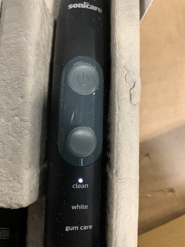 Photo 1 of Philips Sonicare ProtectiveClean 5300 Rechargeable Electric Toothbrush, with Pressure Sensor, 3 Cleaning Modes, SmarTimer and QuadPacer, with 2 Bonus Brush Heads, Travel Case, Black, Model HX6423/34