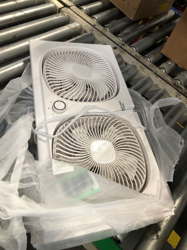 Photo 1 of ** two**
Comfort Zone CZ329WT 9" Dual Window Fan with 180° Rotating Fans, 2-Speeds, Plastic Removable Bug Screen, Individually Rotating Fan Heads, White