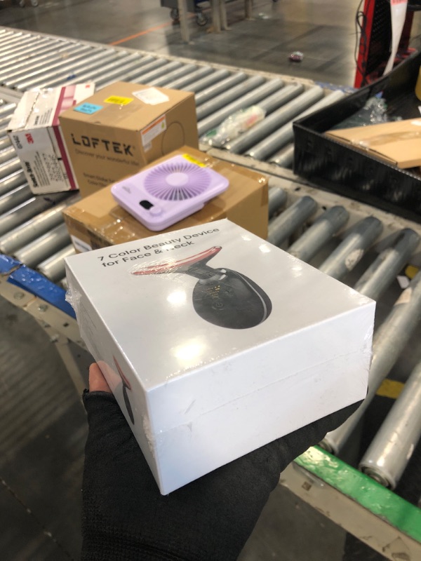 Photo 1 of ** SEALED**
ELISHINE Red-Light-Therapy-for-Face and Neck, 7 Color Light Based Facial Massager, Portable Skin Care Tool (Black)