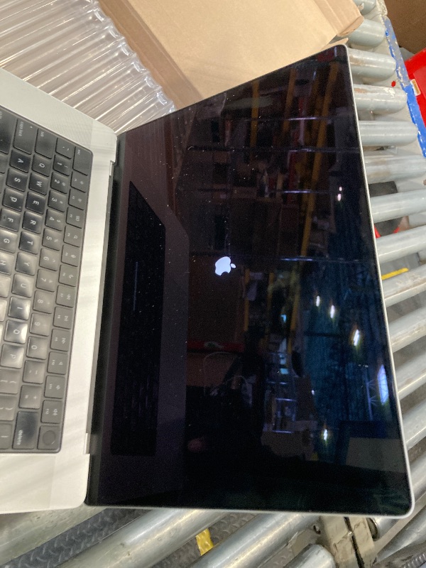 Photo 1 of ***LOCKED****Apple MacBook Pro Late 2021 with Apple M1 Pro chip (16-inch, 16GB RAM, 512GB SSD) Space Gray (Renewed)