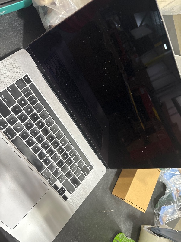 Photo 1 of Late 2019 Apple MacBook Pro with 2.4GHz Intel Core i9 (16 inch, 64GB, 1TB SSD) Space Gray (Renewed)