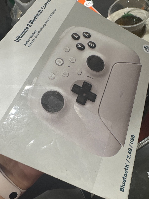 Photo 1 of 8BitDo Ultimate 2 Bluetooth Controller with TMR Joysticks for Switch, Windows PC, Gaming Controller with Switchable Hall Effect/Tactile Triggers, RGB Fire Ring, Charging Dock,Vibration and Motion control, White