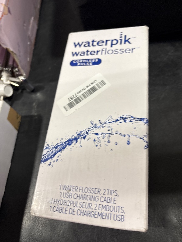 Photo 1 of Waterpik Cordless Pulse Rechargeable Portable Water Flosser for Teeth, Gums, Braces Care and Travel with 2 Flossing Tips, Waterproof, ADA Accepted, WF-20 Blue, Packaging May Vary