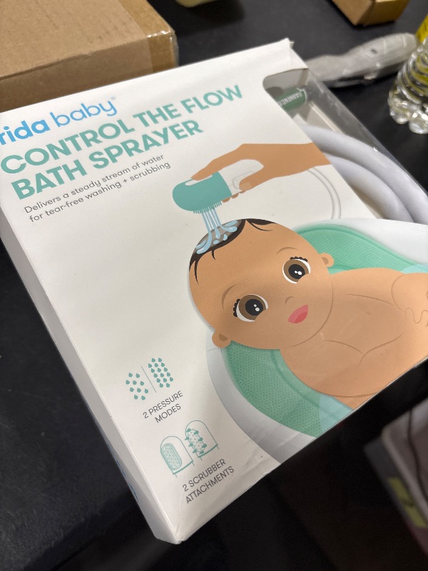 Photo 1 of Frida Baby Control The Flow Bathtub Sprayer Attachment for Baby Bathtub, Shower Head with Scalp Massager, Control Waterflow with 2 Pressure Modes