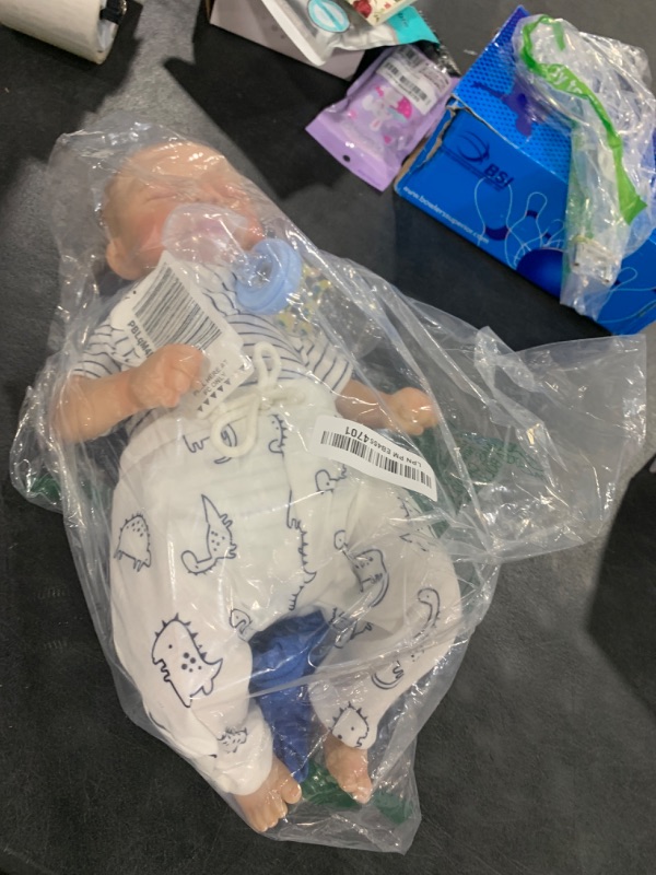 Photo 1 of WOOROY Realistic Reborn Baby Dolls Boy - 18-Inch Newborn Baby Dolls with Soft Cloth Body Sleeping Lifelike Reborn Baby Dolls Birthday Gift for Kids Age 3+