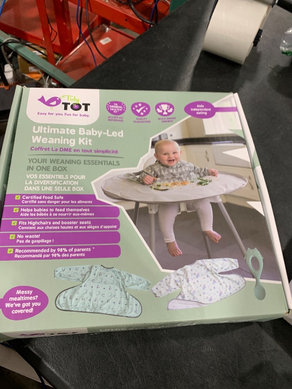 Photo 1 of Tidy Tot- Bib & Tray Kit Baby Feeding Set - 3 Mess Proof Long Sleeve Smocks Attaches to Feeding Mat - Waterproof Bibs – Machine Washable & 1 Silicone Spoon. Fits Babies and Toddlers 6-36 months.