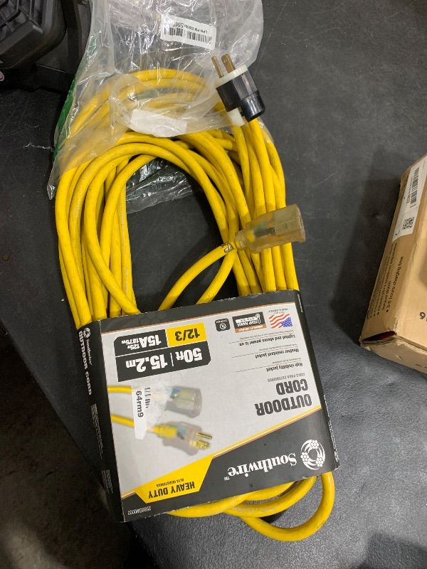 Photo 1 of Southwire Outdoor Extension Cord, 50 Ft, 12 gauge 3 prong, Heavy Duty, SJTW Cord, Yellow, 2588
