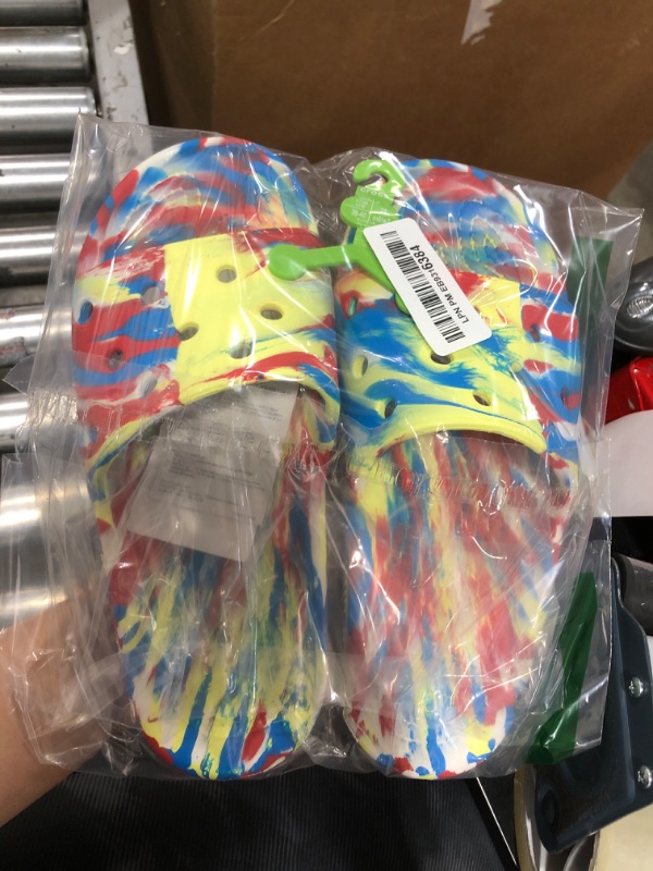 Photo 1 of Crocs Unisex Classic Tie Dye Slides Sandal, Sulphur/Multi, Numeric_7 US Men