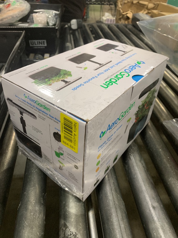 Photo 1 of AeroGarden Harvest 2.0, Indoor Garden Hydroponic System with LED Grow Light, Holds up to 6 AeroGarden Pods, Black